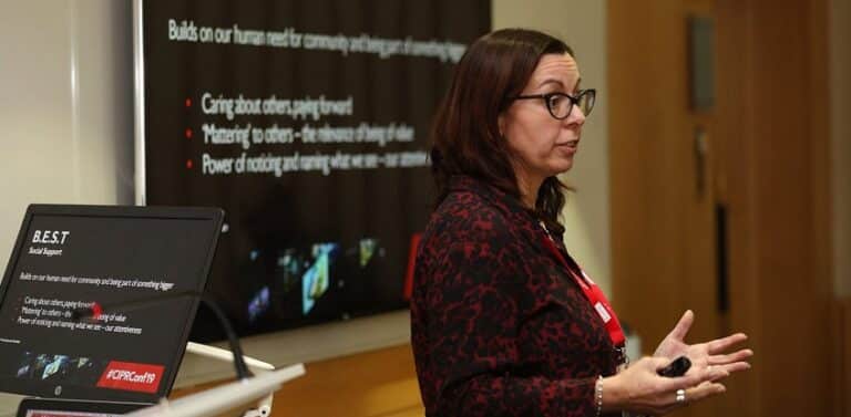 Change coach, Jo Twiselton presenting in front of a screen