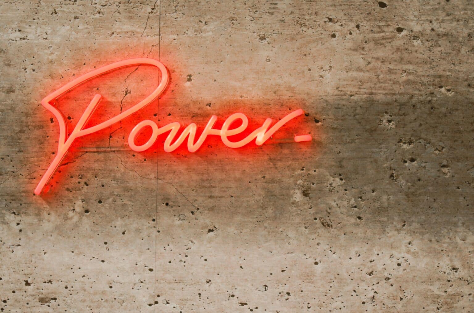 Elise Coates unsplash image of power written as a neon light