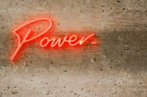 Elise Coates unsplash image of power written as a neon light
