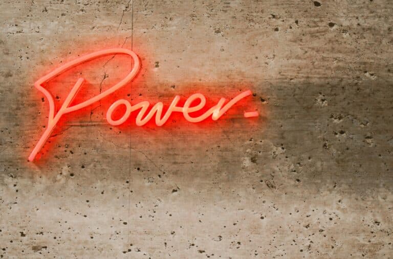 Elise Coates unsplash image of power written as a neon light