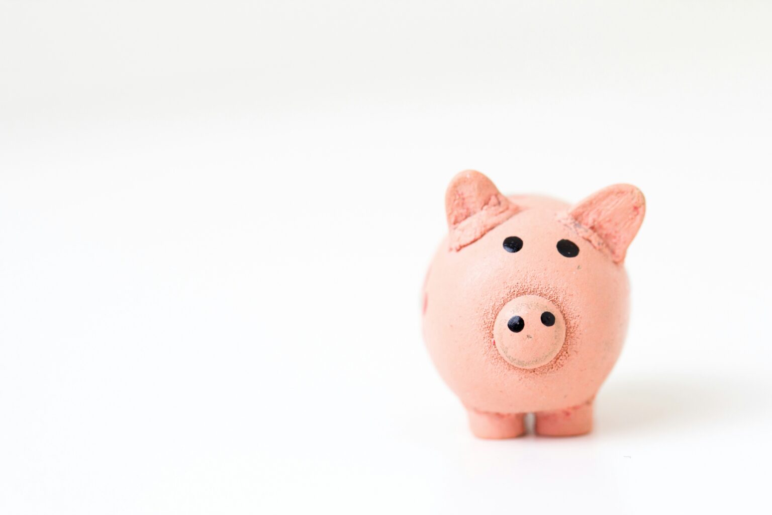 Photo by Fabian Blank on Unsplash of a piggy bank